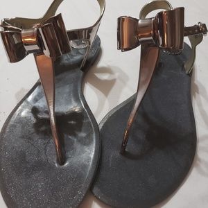 CUTENESS Pewter/metallic color.  Sparkles in sole.